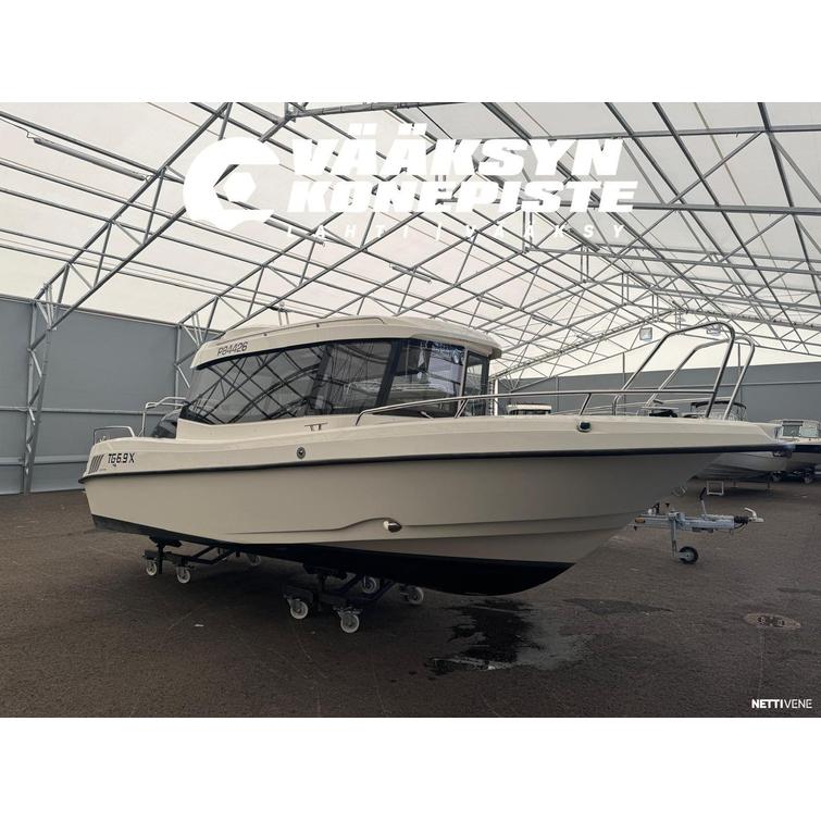 TG 6.9 X + Yamaha F150