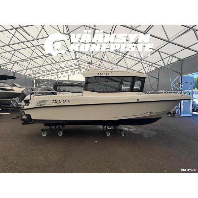 TG 6.9 X + Yamaha F150
